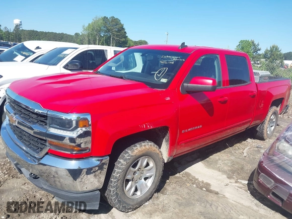 2018 Chevrolet Silverado 1500 LT with VIN 1GCUKREC0JF222376, listed as a IAAI auction lot 42121748 with 143,472 mi miles and . Bid and sale history available at DreamBid. Image 2.