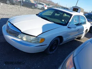 2002 Lincoln Continental with VIN 1LNHM97V92Y678663, listed as a IAAI auction lot 41777625 with 173,329 mi miles and . Bid and sale history available at DreamBid. Image 2.