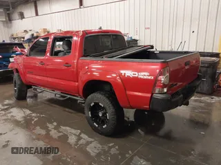 2015 Toyota Tacoma with VIN 3TMLU4EN3FM196518, listed as a IAAI auction lot 41198481 with 96,277 mi miles and . Bid and sale history available at DreamBid. Image 3.