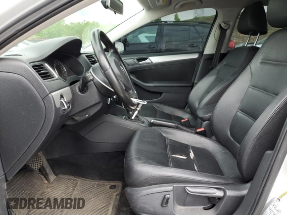 2014 Volkswagen Jetta SE with VIN 3VWD17AJ0EM314456, listed as a Copart auction lot 57380645 with 148,801 mi miles and Salvage title. Bid and sale history available at DreamBid. Image 7.