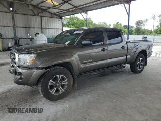 2009 Toyota Tacoma PreRunner with VIN 3TMKU72N89M021378, listed as a Copart auction lot 57142405 with 199,745 mi miles and Salvage title. Bid and sale history available at DreamBid. Image 1.