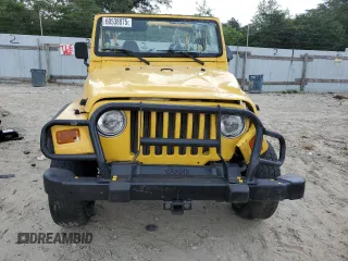 2000 Jeep Wrangler Sport with VIN 1J4FA49SXYP789791, listed as a Copart auction lot 60538875 with Not provided miles and Salvage title. Bid and sale history available at DreamBid. Image 5.