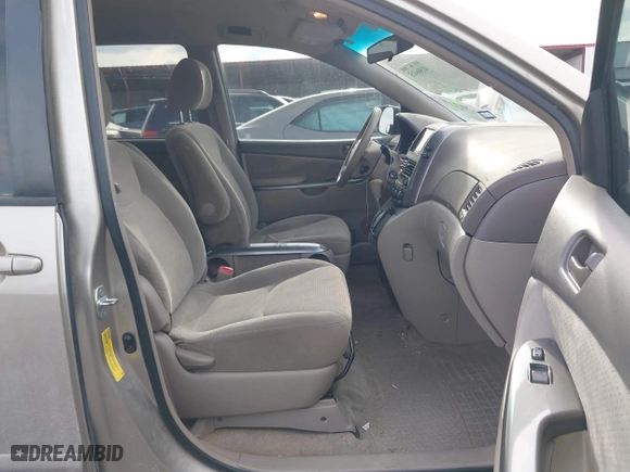2010 Toyota Sienna CE with VIN 5TDKK4CC9AS311702, listed as a IAAI auction lot 41586415 with 206,453 mi miles. Bid and sale history available at carsss.com. Image 5.