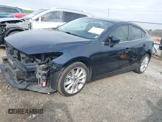 2015 Mazda 3 S Grand Touring with VIN JM1BM1W37F1255297, listed as a IAAI auction lot 41836467 with 145,361 mi miles and . Bid and sale history available at DreamBid. Image 2.