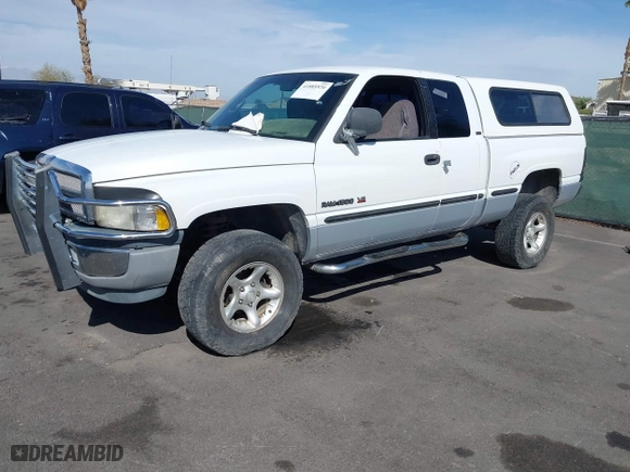 1999 Dodge Ram 1500 with VIN 1B7HF13ZXXJ600062, listed as a IAAI auction lot 41885520 with 217,643 mi miles. Bid and sale history available at carsss.com. Image 2.
