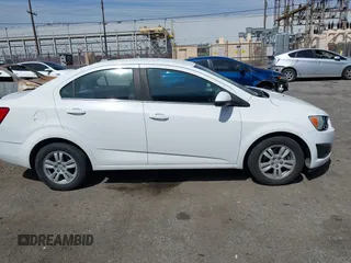 2014 Chevrolet Sonic LT with VIN 1G1JC5SH9E4212898, listed as a IAAI auction lot 41852112 with 121,382 mi miles and . Bid and sale history available at DreamBid. Image 13.