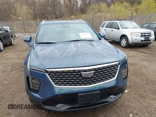 2024 Cadillac XT4 AWD Premium Luxury with VIN 1GYFZDR45RF143981, listed as a IAAI auction lot 42032787 with 14,700 mi miles and . Bid and sale history available at DreamBid. Image 12.