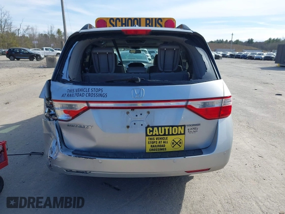 2012 Honda Odyssey Touring with VIN 5FNRL5H95CB063003, listed as a IAAI auction lot 41871975 with 179,332 mi miles and . Bid and sale history available at DreamBid. Image 16.