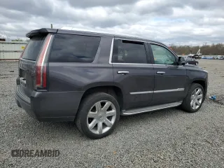 2015 Cadillac Escalade Luxury z VIN 1GYS4BKJXFR238094, wystawiony jako Copart lot #53188355 z przebiegiem Nie podano mil oraz Szkody całkowita. Historia ofert i sprzedaży dostępna na DreamBid. Obrazek 3.