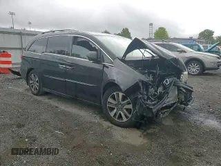 2014 Honda Odyssey Touring with VIN 5FNRL5H95EB056118, listed as a Copart auction lot 57729865 with Not provided miles and Salvage title. Bid and sale history available at DreamBid. Image 15.
