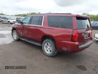 2020 Chevrolet Suburban LT with VIN 1GNSKHKC9LR233603, listed as a IAAI auction lot 41311582 with 104,754 mi miles. Bid and sale history available at carsss.com. Image 3.