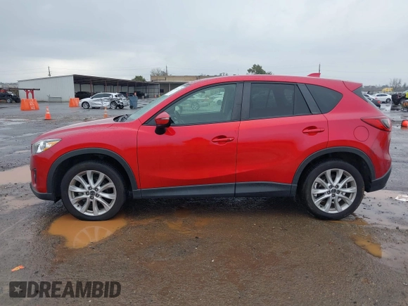 2015 Mazda CX-5 Grand Touring with VIN JM3KE4DY6F0501072, listed as a IAAI auction lot 41534176 with 90,160 mi miles. Bid and sale history available at carsss.com. Image 14.