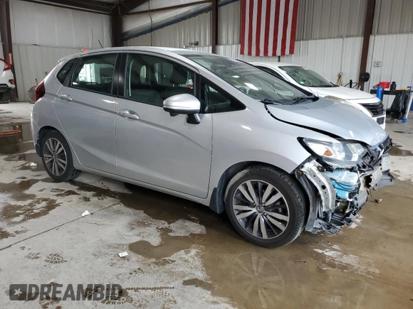 2015 Honda Fit EX-L with VIN 3HGGK5H87FM737610, listed as a Copart auction lot 62466515 with 103,454 mi miles and Salvage title. Bid and sale history available at DreamBid. Image 4.