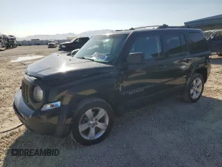 2014 Jeep Patriot Latitude with VIN 1C4NJRFB5ED855888, listed as a Copart auction lot 57969355 with 113,196 mi miles and Salvage title. Bid and sale history available at DreamBid. Image 1.