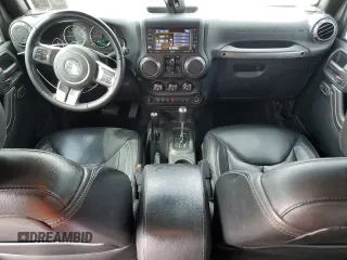 2018 Jeep Wrangler Unlimited Sahara with VIN 1C4BJWEG4JL822007, listed as a Copart auction lot 61450915 with 91,148 mi miles and Salvage title. Bid and sale history available at DreamBid. Image 8.