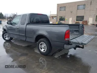 2003 Ford F-150 XL with VIN 1FTRX17W03NB51687, listed as a IAAI auction lot 41712022 with 183,428 mi miles. Bid and sale history available at carsss.com. Image 3.