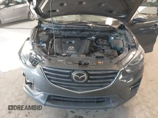 2016 Mazda CX-5 Grand Touring with VIN JM3KE2DYXG0846787, listed as a IAAI auction lot 41346364 with 113,553 mi miles. Bid and sale history available at carsss.com. Image 10.