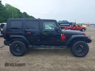 2008 Jeep Wrangler Unlimited Sahara with VIN 1J4GA59128L504798, listed as a IAAI auction lot 42210839 with 162,406 mi miles and . Bid and sale history available at DreamBid. Image 14.
