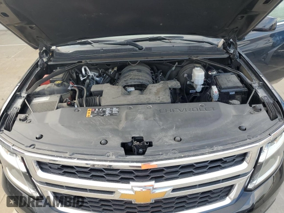 2019 Chevrolet Tahoe LT with VIN 1GNSKBKC2KR349527, listed as a Copart auction lot 58496695 with 128,590 mi miles and Salvage title. Bid and sale history available at DreamBid. Image 12.