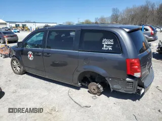 2019 Dodge Grand Caravan SXT with VIN 2C4RDGCGXKR544804, listed as a Copart auction lot 50047295 with 112,374 mi miles and Salvage Title. Bid and sale history available at DreamBid. Image 2.
