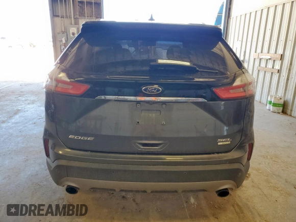 2019 Ford Edge SEL z VIN 2FMPK3J96KBC72783, wystawiony jako Copart lot #57761175 z przebiegiem 153 590 mil mil oraz Czysty tytuł • Clean title. Historia ofert i sprzedaży dostępna na DreamBid. Obrazek 6.