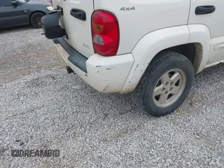 2002 Jeep Liberty Limited with VIN 1J4GL58K32W246480, listed as a IAAI auction lot 41832097 with 300,097 mi miles and . Bid and sale history available at carsss.com. Image 14.