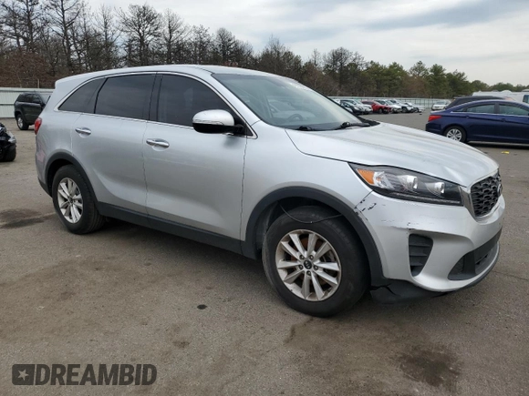 2019 Kia Sorento S with VIN 5XYPG4A51KG573210, listed as a Copart auction lot 49276015 with 100,989 mi miles and Salvage Title. Bid and sale history available at carsss.com. Image 4.