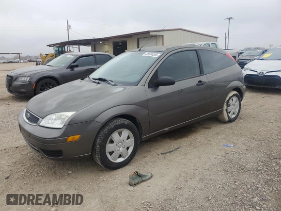 2007 Ford Focus S with VIN 1FAFP31N87W226088, listed as a Copart auction lot 88584555 with 83,896 mi miles and Salvage Title. Bid and sale history available at DreamBid. Image 1.