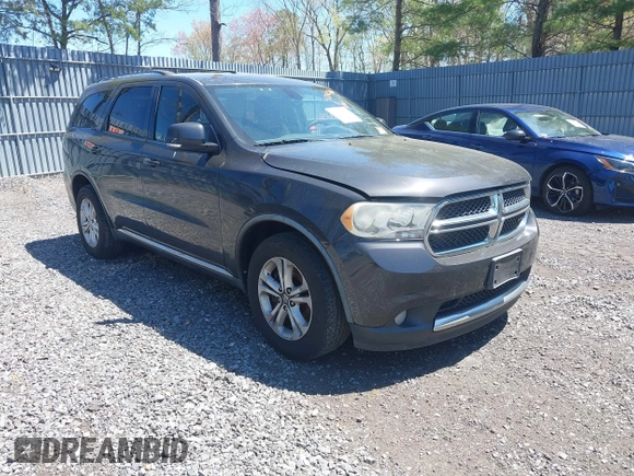 2011 Dodge Durango Crew with VIN 1D4SE4GT6BC664597, listed as a IAAI auction lot 42142568 with 202,275 mi miles and . Bid and sale history available at carsss.com. Image 1.
