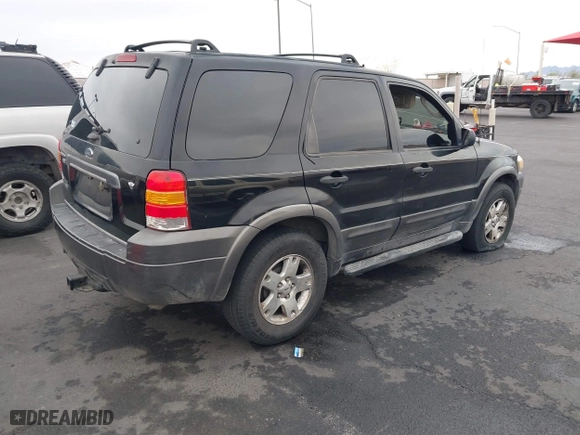 2006 Ford Escape XLT with VIN 1FMYU03156KA42961, listed as a IAAI auction lot 41820423 with 168,212 mi miles. Bid and sale history available at carsss.com. Image 4.