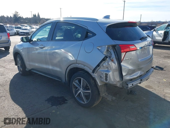 2021 Honda HR-V EX with VIN 3CZRU6H59MM749892, listed as a IAAI auction lot 41550074 with 61,590 mi miles. Bid and sale history available at carsss.com. Image 3.