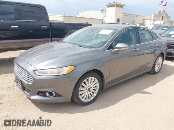 2014 Ford Fusion Titanium with VIN 3FA6P0SU0ER269411, listed as a IAAI auction lot 42163704 with 169,355 mi miles and . Bid and sale history available at DreamBid. Image 2.