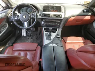 2016 BMW 6 Series 650i xDrive z VIN WBA6D6C57GG388027, wystawiony jako Copart lot #53157535 z przebiegiem 52 147 mil mil oraz Szkody całkowita. Historia ofert i sprzedaży dostępna na DreamBid. Obrazek 8.
