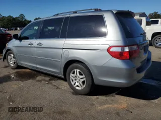 2005 Honda Odyssey EX-L with VIN 5FNRL38635B120859, listed as a Copart auction lot 80729254 with 0 mi miles and Salvage Title. Bid and sale history available at carsss.com. Image 2.