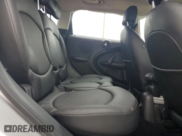 2012 MINI Countryman with VIN WMWZB3C5XCWM06778, listed as a Copart auction lot 61201285 with 64,676 mi miles and Salvage title. Bid and sale history available at DreamBid. Image 10.