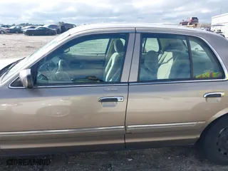 2005 Mercury Grand Marquis GS with VIN 2MEFM74W55X603152, listed as a IAAI auction lot 41872534 with 84,290 mi miles. Bid and sale history available at carsss.com. Image 14.