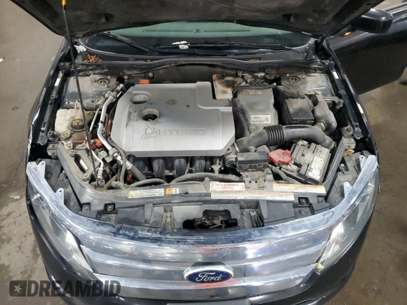 2012 Ford Fusion Hybrid с VIN 3FADP0L33CR231536, выставлен на аукционе Copart как лот 55330545 с пробегом 165 481 миль миль и Списание • Salvage title. История ставок и продаж доступна на DreamBid. Изображение 11.