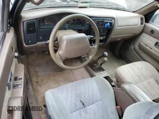 1998 Toyota Tacoma with VIN 4TAWN72N2WZ010087, listed as a Copart auction lot 47650315 with 317,285 mi miles and Salvage Title. Bid and sale history available at DreamBid. Image 8.