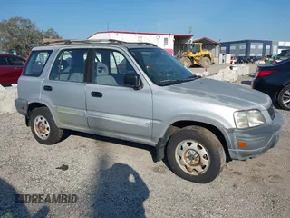 1997 Honda CR-V with VIN JHLRD184XVC014120, listed as a IAAI auction lot 41684375 with 144,915 mi miles. Bid and sale history available at carsss.com. Image 1.