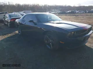2013 Dodge Challenger SXT with VIN 2C3CDYAG5DH520017, listed as a IAAI auction lot 41882517 with 128,854 mi miles. Bid and sale history available at carsss.com. Image 1.