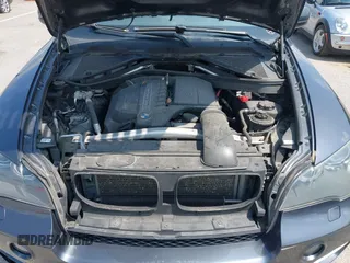 2011 BMW X5 35i with VIN 5UXZV4C57BL739907, listed as a IAAI auction lot 42135572 with 0 mi miles. Bid and sale history available at carsss.com. Image 10.