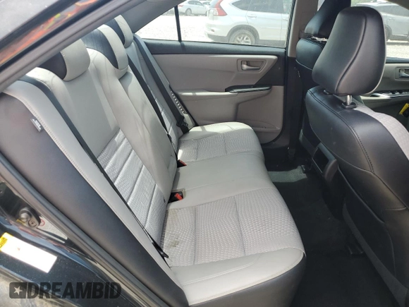 2015 Toyota Camry LE z VIN 4T1BD1FK9FU142761, wystawiony jako Copart lot #56158295 z przebiegiem 127 761 mil mil oraz Szkoda całkowita • Salvage title. Historia ofert i sprzedaży dostępna na DreamBid. Obrazek 10.