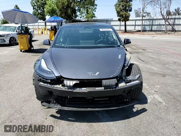 2023 Tesla Model 3 with VIN 5YJ3E1EA4PF615975, listed as a Copart auction lot 58845405 with 38,927 mi miles and Salvage title. Bid and sale history available at DreamBid. Image 13.