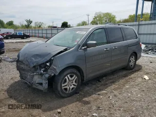 2007 Honda Odyssey EX-L z VIN 5FNRL38667B409169, wystawiony jako Copart lot #54538245 z przebiegiem 136 040 mil mil oraz Szkoda całkowita • Salvage title. Historia ofert i sprzedaży dostępna na DreamBid. Obrazek 1.