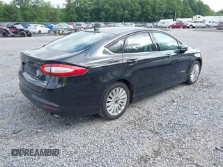 2015 Ford Fusion SE Hybrid с VIN 3FA6P0LU0FR236411, выставлен на аукционе IAAI как лот 42553364 с пробегом 150 133 миль миль и . История ставок и продаж доступна на DreamBid. Изображение 4.