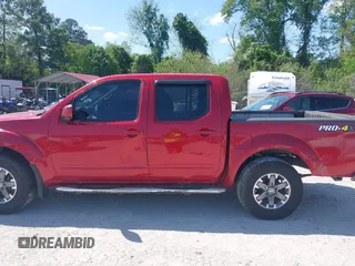 2014 Nissan Frontier S with VIN 1N6AD0EV3EN734085, listed as a IAAI auction lot 42007200 with Not provided miles and . Bid and sale history available at DreamBid. Image 13.