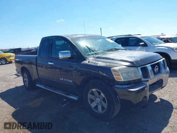 2005 Nissan Titan XE with VIN 1N6BA06A15N560400, listed as a IAAI auction lot 41656560 with 212,568 mi miles. Bid and sale history available at carsss.com. Image 13.