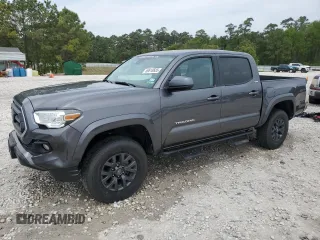 2021 Toyota Tacoma SR5 z VIN 5TFAZ5CN6MX098110, wystawiony jako Copart lot #50618655 z przebiegiem 72 318 mil mil oraz Czysty tytuł • Clean title. Historia ofert i sprzedaży dostępna na DreamBid. Obrazek 1.