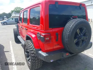 2021 Jeep Wrangler Unlimited Sahara z VIN 1C4HJXEGXMW631033, wystawiony jako IAAI lot #42550070 z przebiegiem 54 429 mil mil oraz . Historia ofert i sprzedaży dostępna na DreamBid. Obrazek 3.