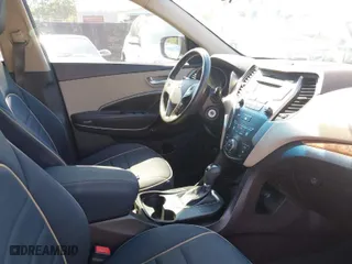 2014 Hyundai Santa Fe Sport with VIN 5XYZT3LB5EG134453, listed as a IAAI auction lot 41573709 with 161,984 mi miles. Bid and sale history available at carsss.com. Image 5.
